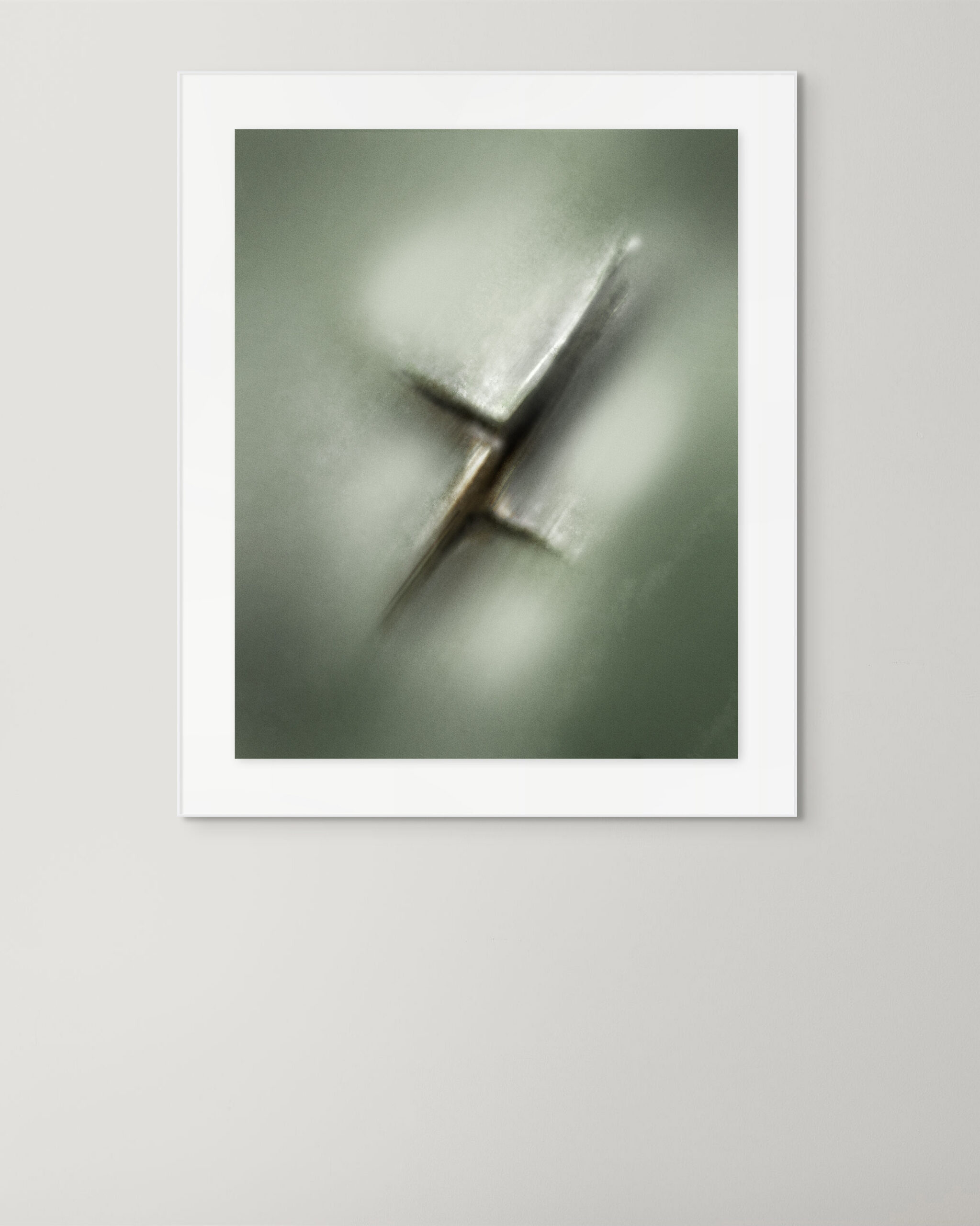 Framed print of Compression Fault by Denis Leclerc, shown on a gallery wall. Abstract composition with diagonal tension and muted green tones.