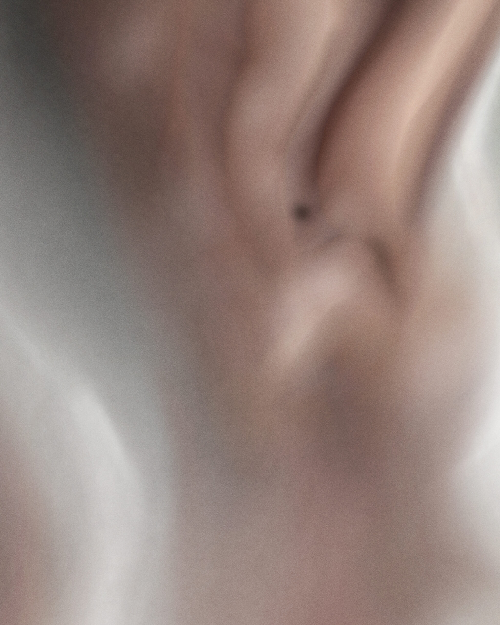 Detail of Ur IV digital artwork showing compressed matter and restrained light, emphasizing density and internal pressure without forming a readable landscape